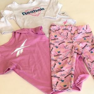 Reebok 3 piece tee and short sleeves creeper and leggings.